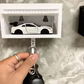 Schlüsselhalter in Garagenform für die Wand